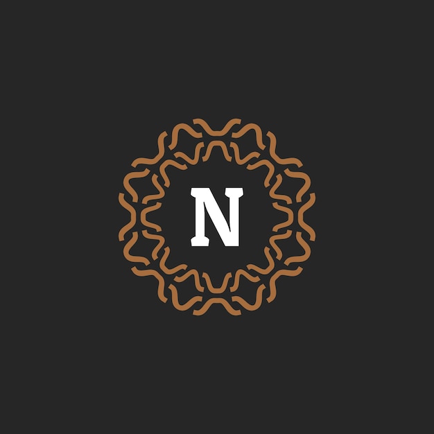 Vector la letra inicial n es el logotipo del marco de círculo con borde ornamental.