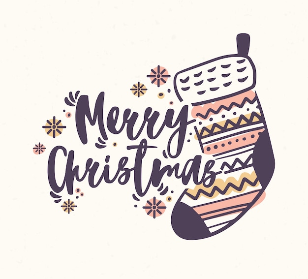 Letras de Feliz Navidad escritas a mano con elegante escritura caligráfica y decoradas con medias de punto o calcetines y copos de nieve