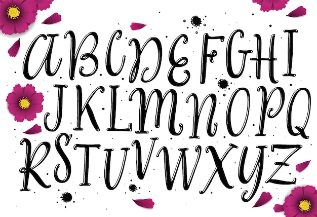 Letras negras del alfabeto con un spray de pintura.