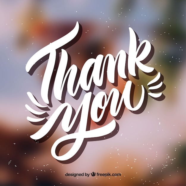 Vector lettering de gracias con fondo desenfocado