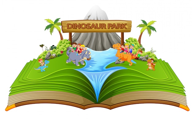 El libro de cuentos verde del parque de dinosaurios con los niños en él.