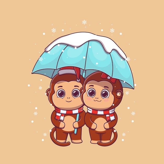 linda pareja de monos bajo un paraguas durante la nevada