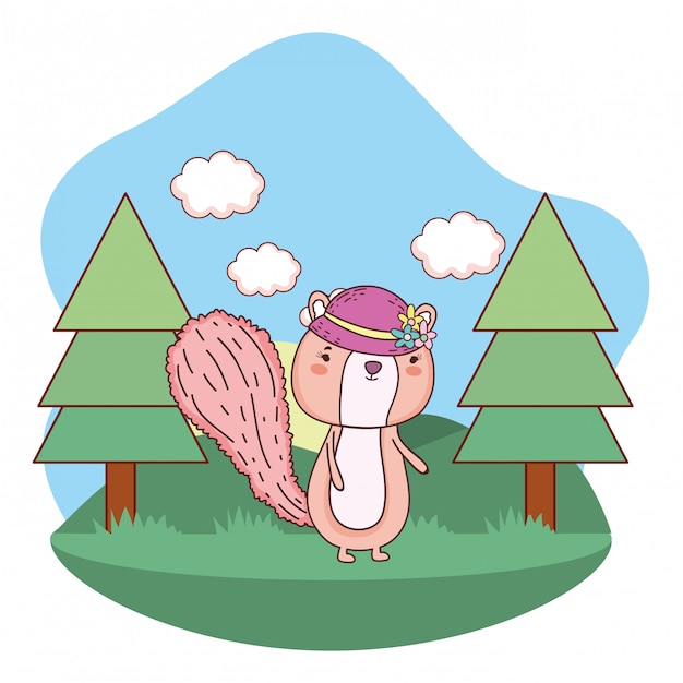 Linda y pequeña ardilla con sombrero femenino en el campo