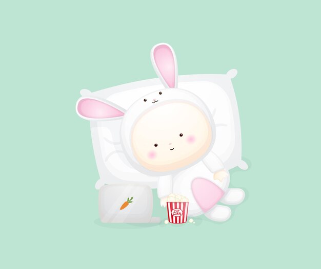 Lindo bebé en traje de conejito acostado y viendo la película. ilustración de dibujos animados Vector Premium