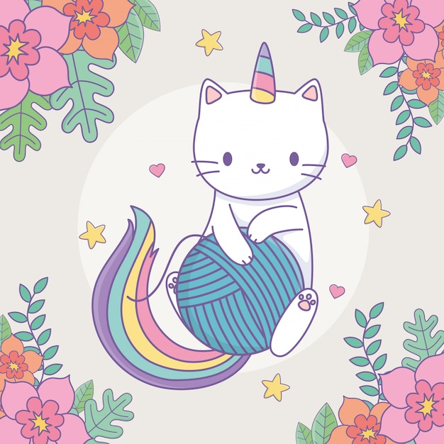 Lindo caticorn con decoración floral y bola de lana.