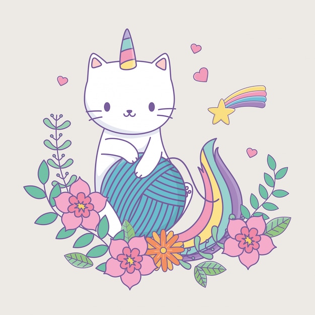 Lindo caticorn con decoración floral y bola de lana.