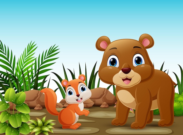 El lindo dibujo animado del zorro y el oso en el bosque