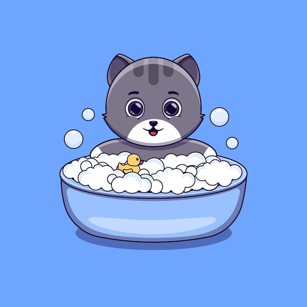 Lindo gato bañándose con juguete de pato y burbujas