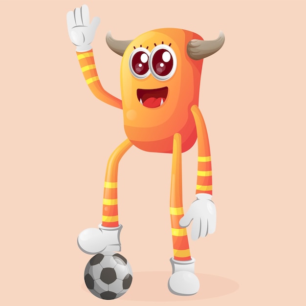 Lindo monstruo naranja jugar fútbol balón de fútbol