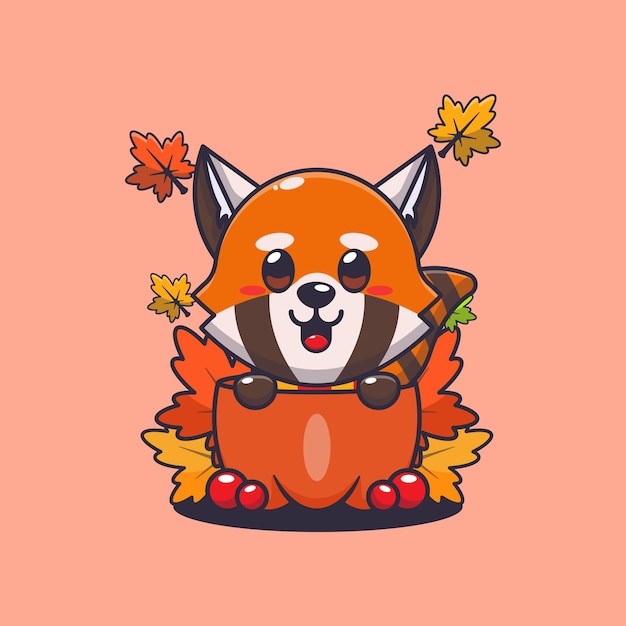El lindo panda rojo en una calabaza en la temporada de otoño