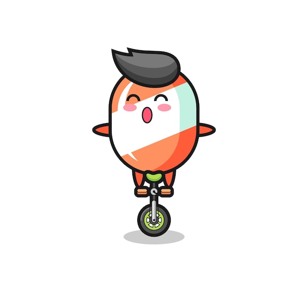 El lindo personaje de caramelo está montando una bicicleta de circo, diseño de estilo lindo para camiseta, pegatina, elemento de logotipo