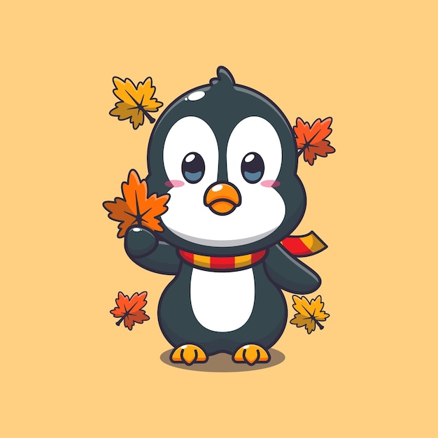 El lindo pingüino con la hoja de otoño
