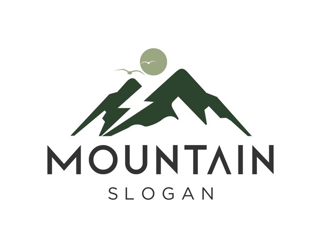Un logo de montaña con montañas y un pájaro en él