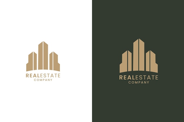 Logotipo estilizado para una empresa inmobiliaria con edificios en oro en fondos contrastantes