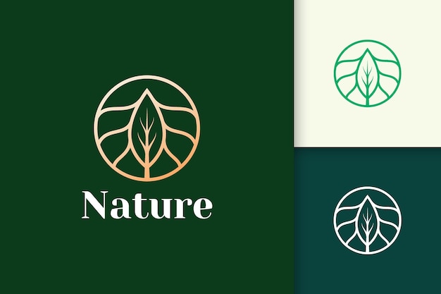 Logotipo de flores de lujo con forma de círculo y hoja para la salud y la belleza