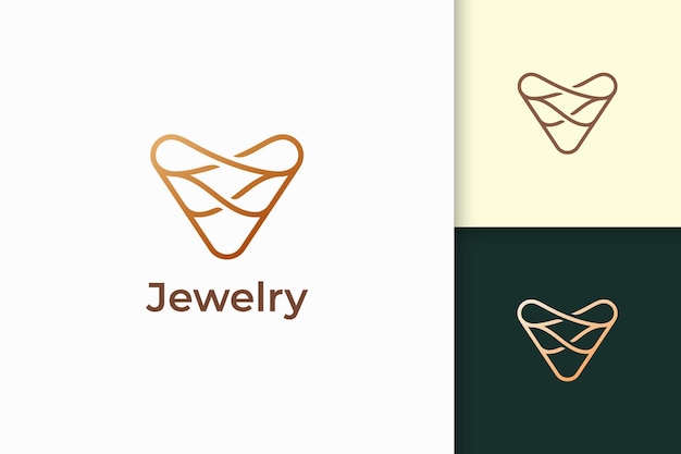 El logotipo de joya de oro de lujo en forma de línea representa expansivo y precioso