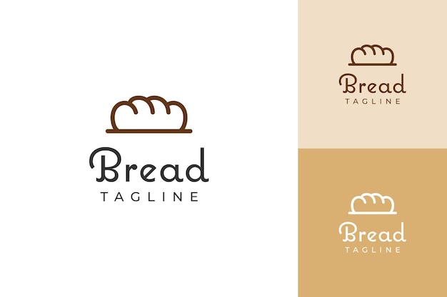 logotipo de la panadería con un pan en la parte superior de las hojas de trigo