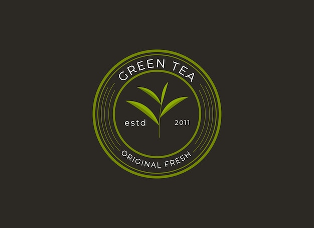 Logotipo de té verde con una planta verde en el frente