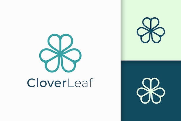 El logotipo del trébol en forma de línea simple y amor representa suerte