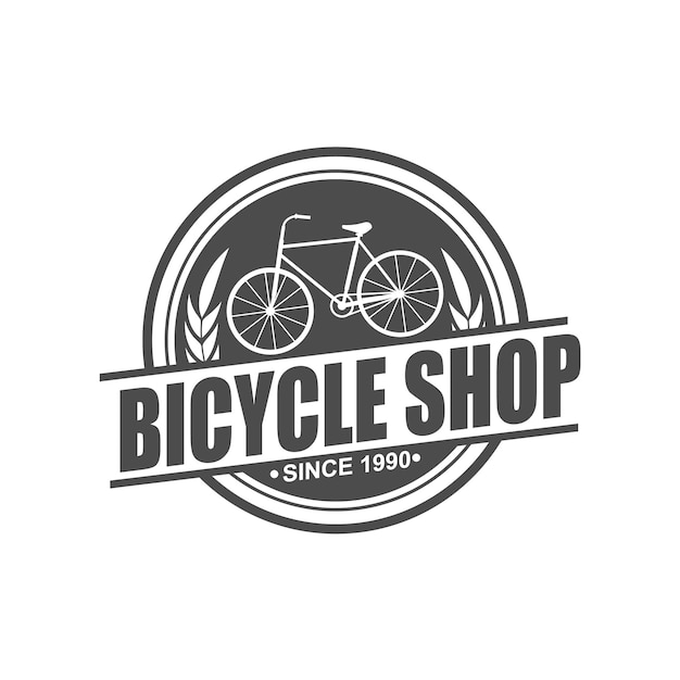 El logotipo vintage de la tienda de bicicletas 1