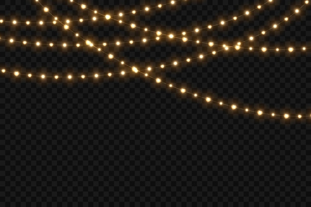 Las luces de las guirnaldas de Navidad brillan en acogedores tonos dorados las bombillas en el alambre brillan suavemente para las vacaciones