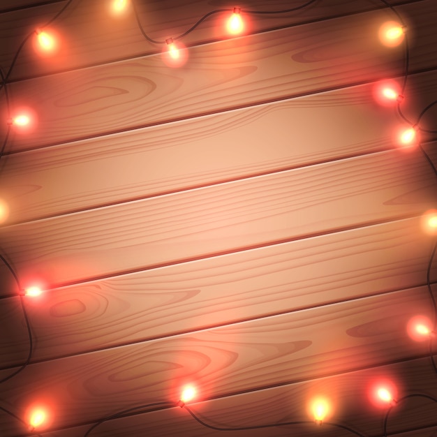 Luces de Navidad aisladas sobre fondo de madera. Colorido brillante guirnalda de Navidad. Plantilla de vectores
