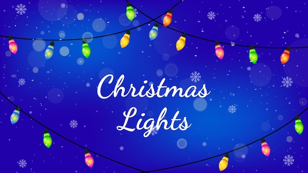 Luces de Navidad con luces LED colgando en un fondo azul