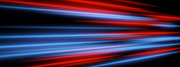 Luces de velocidad borrosas. Las líneas rojas y moradas con un amplio desenfoque de movimiento crean un efecto de movimiento horizontal en capas.