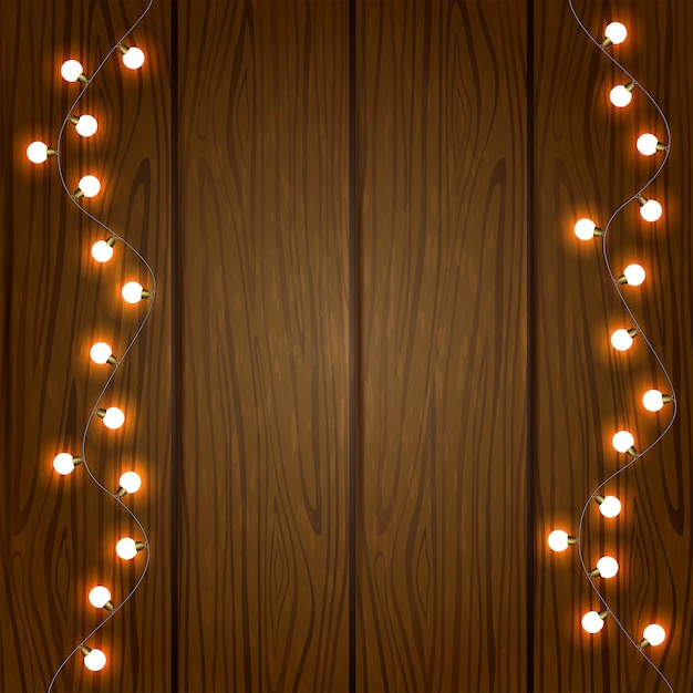 Luz de Navidad sobre fondo de madera