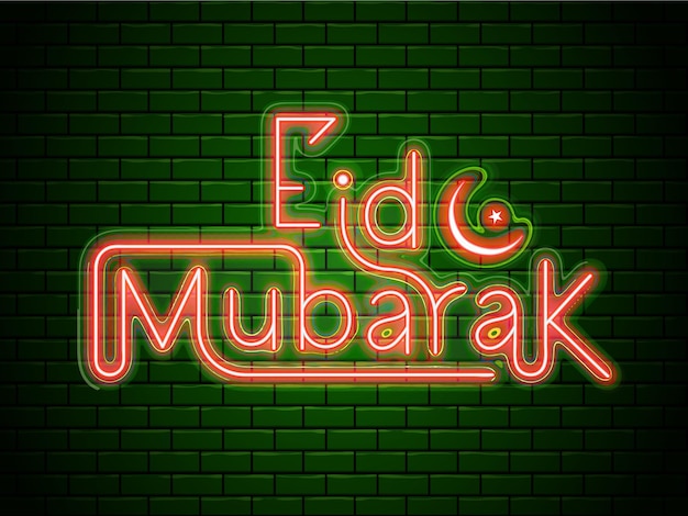 Luz de neón roja Texto de Eid Mubarak en la pared de ladrillo verde para el concepto de celebración de la fiesta islámica