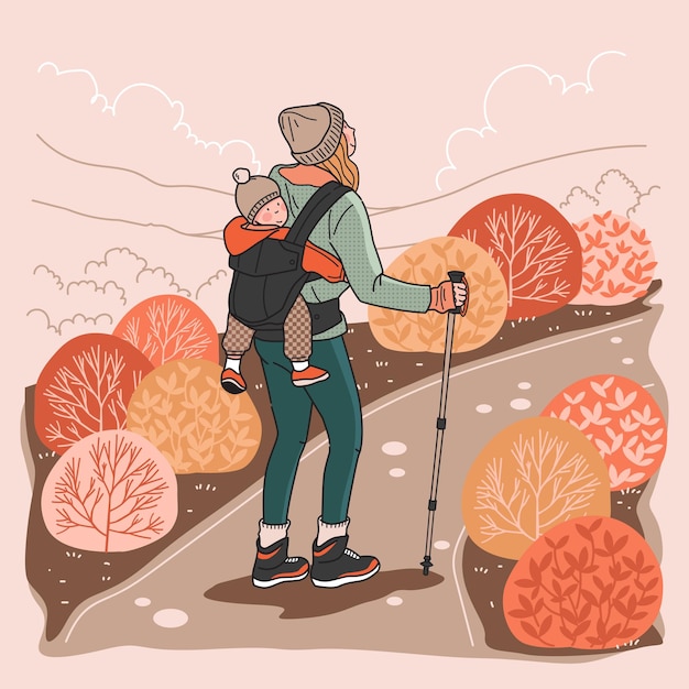 Una madre con un bebé caminando por el bosque