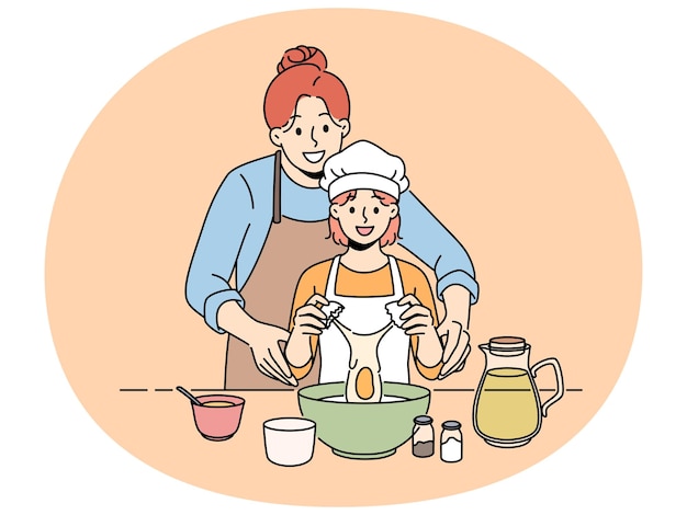 Una madre sonriente cocina junto con su hija pequeña