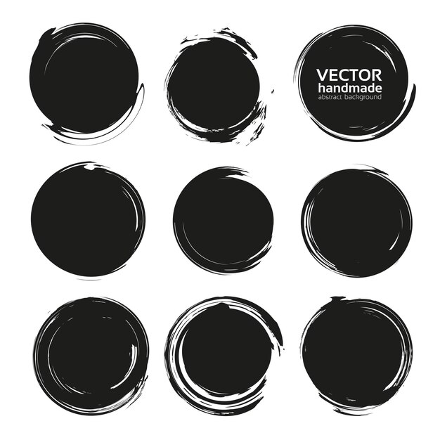 Las manchas de círculo sólido de textura abstracta negra aisladas sobre un fondo blanco