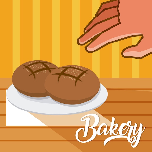 Mano agarrando productos de panadería en el plato