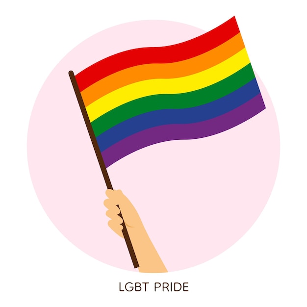La mano con la bandera del orgullo del arco iris