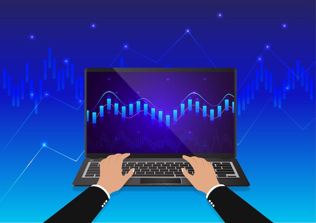 Mano escribiendo en el teclado con una vista de portátil de monitor gráfico comercial