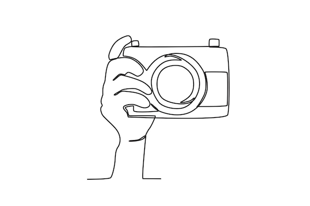 Una mano fija el enfoque de una cámara digital Dibujo en línea del día mundial de la fotografía
