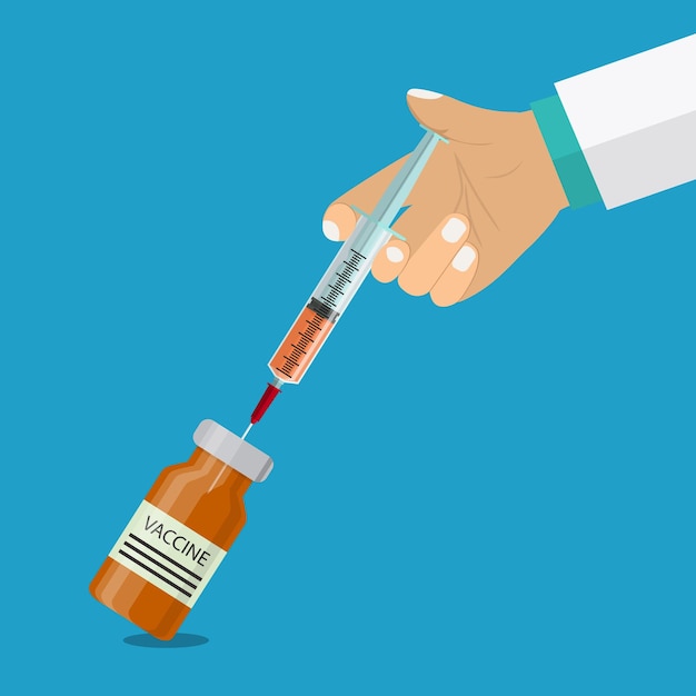 La mano del médico con la jeringa