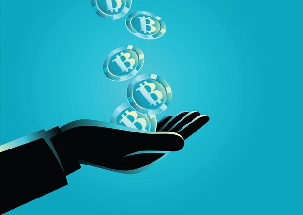 Mano que sostiene bitcoins