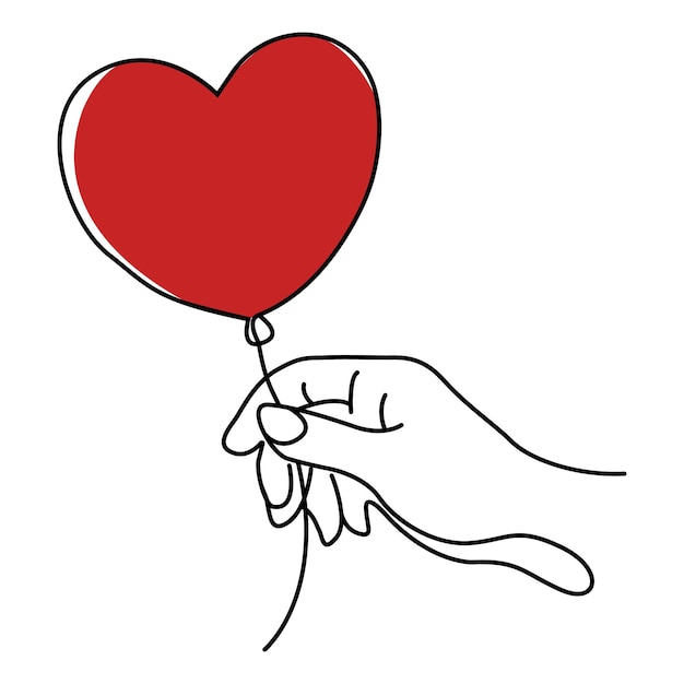 Una mano sosteniendo un globo en forma de corazón rojo