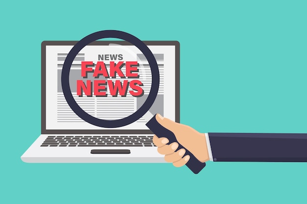 Mano sosteniendo una lupa en busca de noticias falsas en la ilustración de vector de computadora portátil
