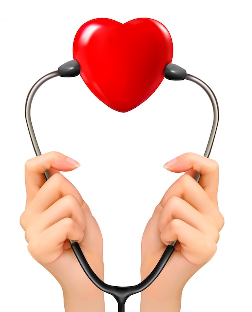Manos sosteniendo un estetoscopio con corazón rojo.
