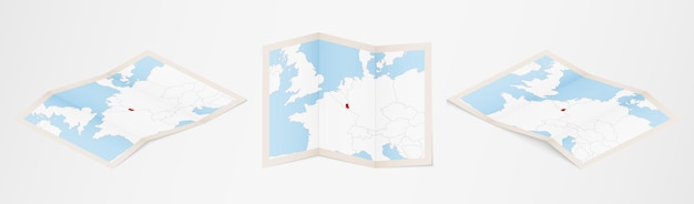 Vector mapa doblado de luxemburgo en tres versiones diferentes.