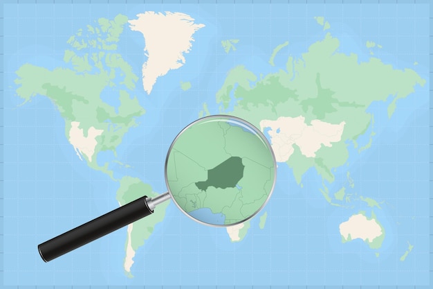 Mapa del mundo con una lupa sobre un mapa de níger.