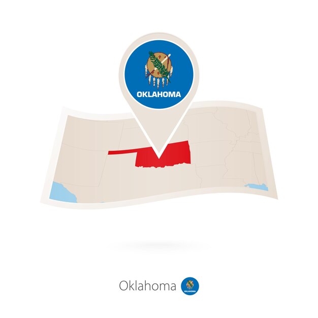 Mapa de papel doblado del estado de Oklahoma con pin de bandera de Oklahoma