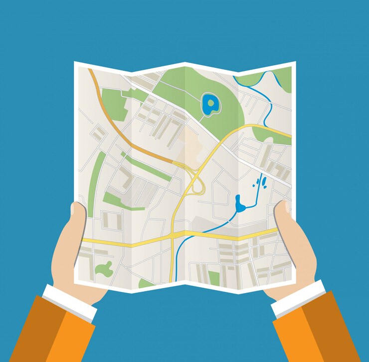 Vector mapa de papel doblado en mano