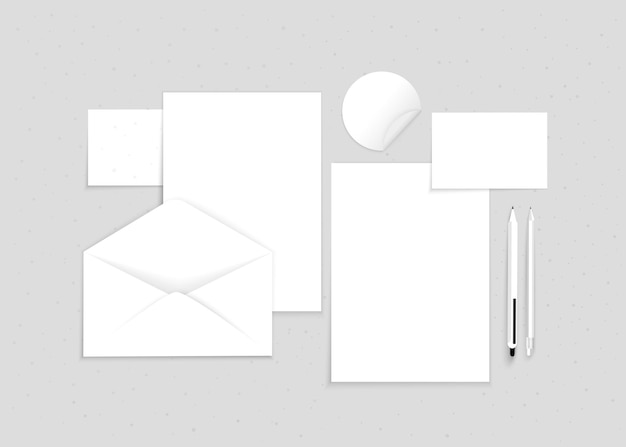 Maqueta vectorial de papelería de oficina en un fondo gris Lápiz A4 hoja tijeras sobre