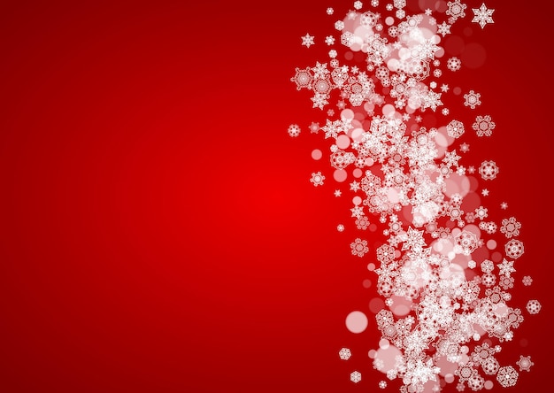 Marco de Navidad con nieve que cae sobre fondo rojo.