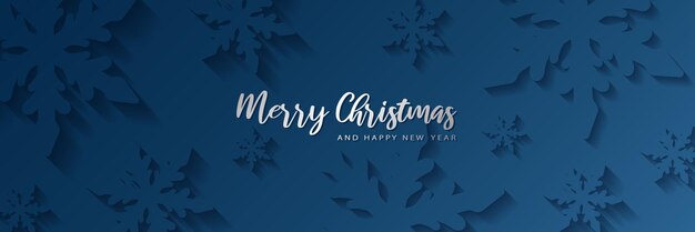 Marco de pancarta de Feliz Navidad con copos de nieve cortados en papel ilustración 3D en fondo azul