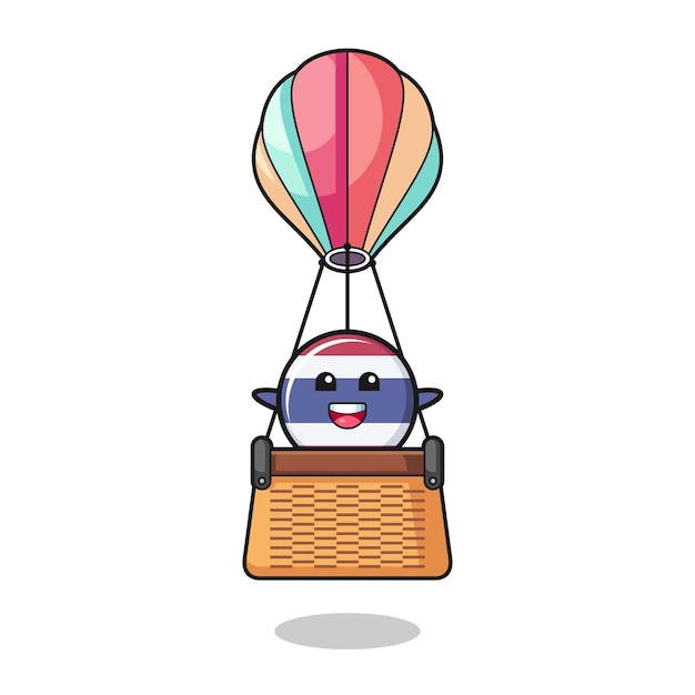 Mascota de la bandera de Tailandia montando un globo aerostático